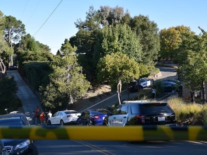 Investigators block off the Orinda neighborhood where a Halloween-party shooting claimed five lives.