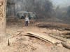A Big Ridge Road cabin, along with its water tanks, leveled in the Walbridge Fire.