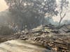 Cabin's charred remains after Walbridge Fire.