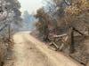 Home's gate along Big Ridge Road suffers fire damage.