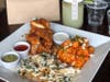 The "Couch Bites Platter" is among Super Bowl takeout platters & bundles at Truxton's American Bistro menus in Torrance, Santa Monica and Westchester/Los Angeles.