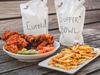 Eureka! puts its wings and beer in a “Supper” Bowl Sunday takeout special for Game Day.