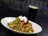 Yard House locales in Brea, Costa Mesa, Irvine and Newport Beach are offering a St. Pat's special: Irish Loaded Fries.