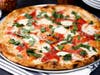 Patxi's Pizza's Margherita Pizza comes with code for Pi Day discount.


