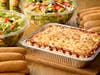 A large pan of classic lasagna, plus salad & breadsticks, is among Olive Garden's takeout options to celebrate Easter at home.