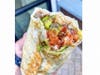 Descanso Mexican Restaurant in Costa Mesa says "Ole!" to  "National Burrito Day" with a half-off burrito special.  