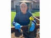 Mike “Lonnie” Kienitz enjoys the raised garden beds, courtesy of his grandson, at Vineyard Place.
