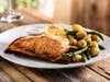 Salmon or tenderloin, plus sides and dessert, can be ordered with "Green Box" takeout at Seasons 52 eateries for Memorial Day weekend in Costa Mesa, Sacramento and San Diego.