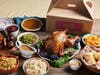 Lucille’s Smokehouse Bar-B-Que is offering two sizes of family feasts to-go.