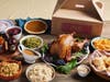 Lucille’s Smokehouse Bar-B-Que is offering two sizes of family feasts to-go.