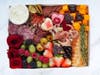 Valentine's Day Edition charcuterie boxes, with roses, too, can be ordered for delivery or pick-up from Luxe Bites LA in Hollywood.