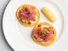 Smoked salmon tostadas are among appetizer options for three-course, Mother's Day brunch at Las Brisas in Laguna Beach.