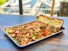 Bring home the family-style "World Famous Shrimp Tray" for Mother's Day feasts from San Pedro Fish Market locales in South Bay.