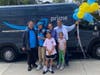 Amazon driver Alexander Ponce (left), surprising Walnut Creek teen Ozzy Wedeking, pictured along with his family. 