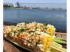 Elotes Callejeros, roasted corn on the cob, is among menu options for July 4th weekend "Stars & Stripes BBQ" brunch at Fuego at Hotel Maya, Long Beach.