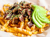 Topa Topa Fries topped with Japanese Wagyu beef, avocado, Topa Topa sauce, Kewpie mayo, crispy onion & furikake.