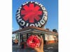 A Red Hot Chili Peppers "Red Hot Donut" is offered until July 31 at Randy's Donuts, along with chances to win tickets to the band's sold-out Sunday concert at SoFi Stadium.