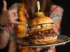 Summer fare at Bar Louie in Tustin includes a tropics-inspired Lu-au Burger.