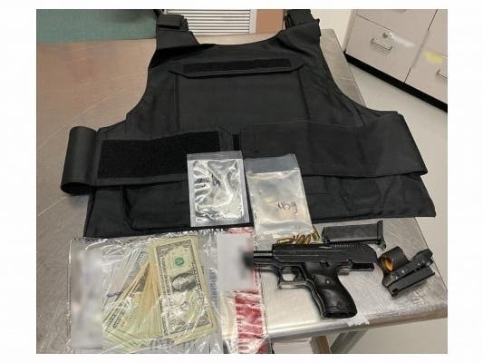 Livermore police said a loaded gun, drugs and cash, along with a ballistic plate carrier vest, were found in a car stopped Monday in Livermore, CA. 