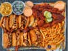 Dave’s Hot Chicken serves chicken tenders, sliders, fries, kale slaw and mac & cheese.