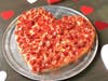 At Mountain Mike’s Pizza, heart-shaped pizza is on the menu for the entire month of February.