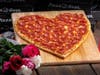Warm hearts with heart-shaped pizzas, available for entire month of February, from Pizza Guys stores.
