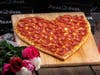 Warm hearts with heart-shaped pizzas, available for entire month of February, from Pizza Guys store in Pacific Beach.
