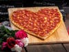 Warm hearts with heart-shaped pizzas, available for entire month of February, from Pizza Guys stores.