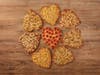 Papa Johns' heart-shaped pizzas -- thin crust with cheese & toppings -- are offered through Valentine's Day.