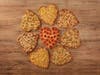 Papa Johns' heart-shaped pizzas -- thin crust with cheese & toppings -- are offered through Valentine's Day.