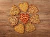 Papa Johns' heart-shaped pizzas -- thin crust with cheese & toppings -- are offered through Valentine's Day.