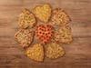 Papa Johns' heart-shaped pizzas -- thin crust with cheese & toppings -- are offered through Valentine's Day.