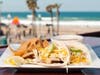Sandbar Sports Grill in Mission Beach is throwing a Game Day viewing party, with award-winning TKO tacos, drink specials & halftime Glutton Bowl.