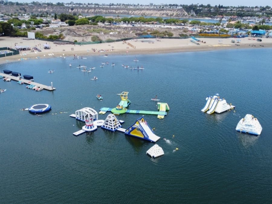 Among top events planned June 3-4, 2023, throughout OC are the Inflatable Water Park at Newport Dunes Waterfront Resort, Newport Beach, the Newport Beach Jazz Festival at Hyatt Regency, and 'Concours d’Elegance' car & motorcycle show in Huntington Beach.
