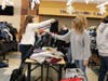 Students sorted over 1,500 gently used coats to distribute to the needy.