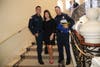 Ginny Wetterau with firefighters Greg Schwan and Maverick Cissell