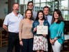 Allison with the Scoggin Family and her family at the scholarship presentation ceremony.