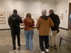 Three VLANJ participants, two using white canes, practice navigating the Montclair Art Museum, guided by a VLANJ orientation and mobility expert.