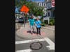 ​The Seeing Eye’s Kristin Lake works with VLANJ participant Peggy Kane on crossing a Maple Avenue intersection in Morristown.​