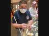 VLANJ participant Matthew Graves examines a gold bracelet at Braunschweiger Jewelers on South Street.