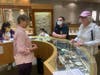 Braunschweiger Jewelers owner Gretchen Braunschweiger shows estate pieces to VLANJ participants. 