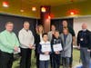 The District 146 Board of Education recognized Gavin Hemminger and Suhail Roussi for their spelling bee accomplishments. 