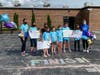 The Girls on the Run club celebrate their final run of the season.