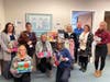 Each year, staff at the District 146 Administration Center collect toys, books, and other items.