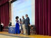 Alexi Cooper receives her certificate from CMS Principal Dr. Clarke.