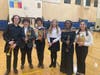 CMS band students gather after performing as part of the ILMEA Honor Band Festival at Unity Junior High in Cicero.