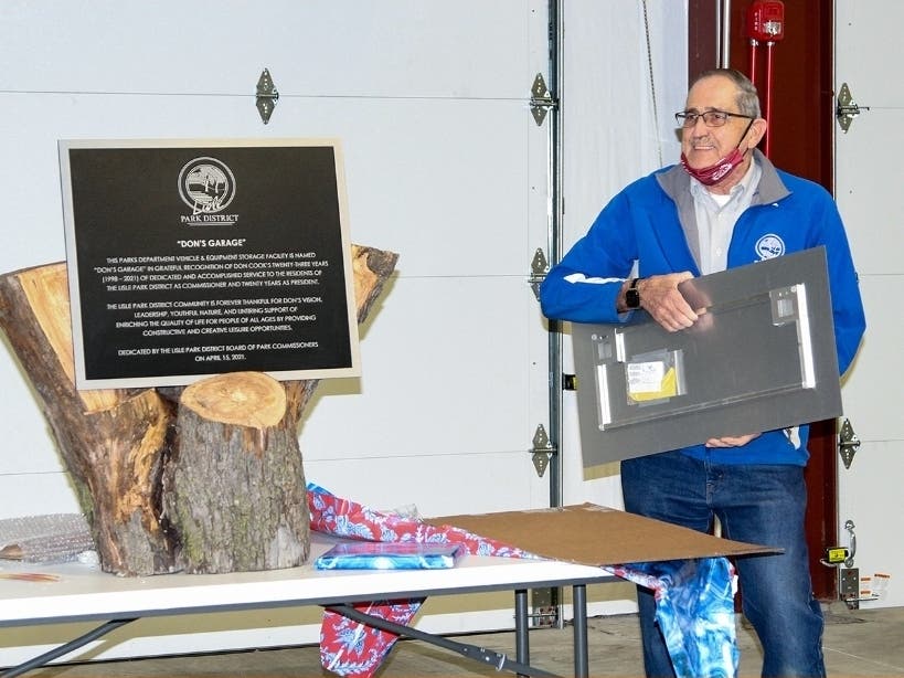 Don Cook receiving Dedication Plaque for Parks Department Vehicle & Equipment Storage Facility, now named "Don's Garage" in His Honor