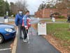 Michelle Royce of Vernon goes to vote at Rockville High School just days after a knee injury. 