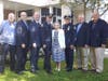 Retirees Inspector Michael Doyle and Detective Richard Pedone pictured with (from left) Trustee John Delany, Village Administrator Ralph Suozzi, Police Commissioner Kenneth Jackson, Mayor Theresa Trouvé and Trustees Mark Hyer and Robert Bolebruch.