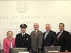 Lt. Thomas Mauren pictured with Mayor Theresa Trouvé, members of the Board of Trustees and Police Commissioner Kenneth Jackson.